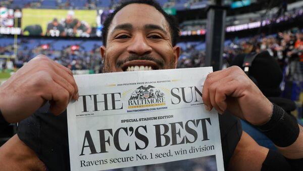 Baltimore clinch AFC North title and top seed in play-offs with Miami mauling