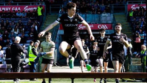 LEADER: Sligo's Canice Mulligan leads his team out for the All-Ireland U20 FC semi final victory over Kerry in 2023. Pic: Evan Logan, Inpho